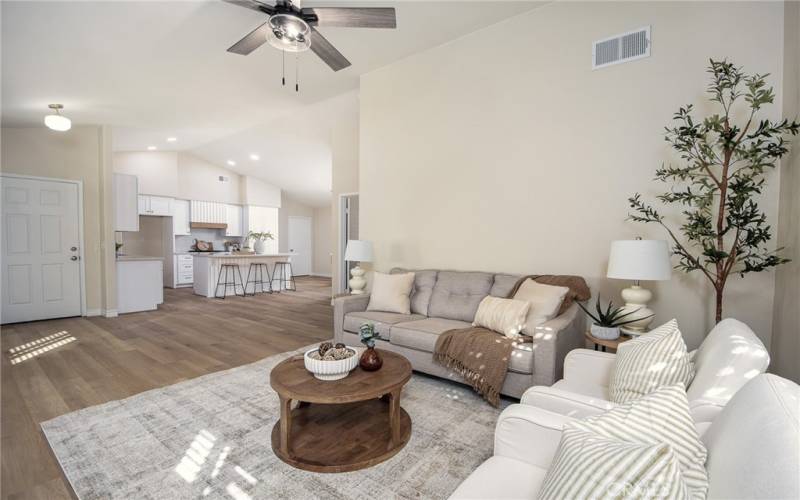 Living room has direct sight lines to the newly renovated kitchen.