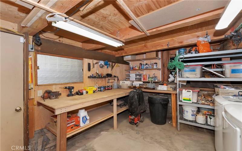 Workshop and laundry area located on the lower level