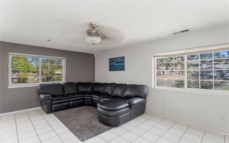 Large living room with lots of natural light