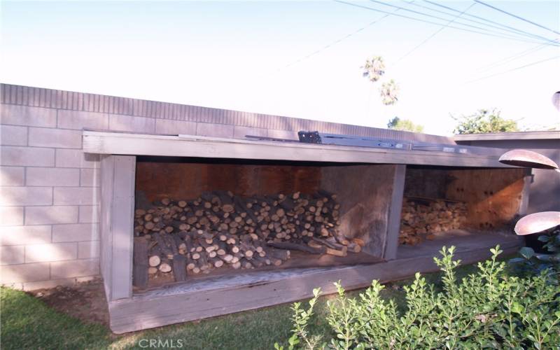 Custom built firewood storage area.