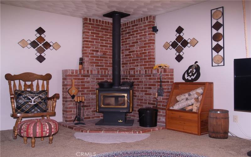 Custom brick work with wood burning stove for those cozy evenings.