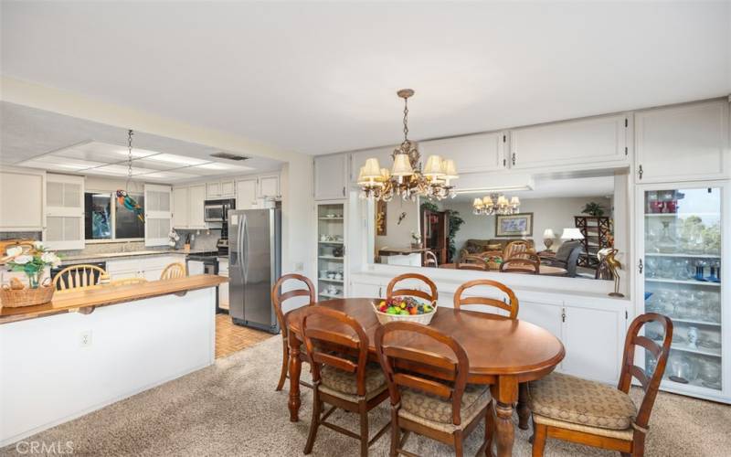 Pony wall divides kitchen from dining area.