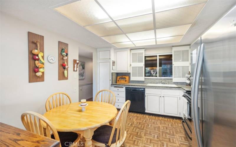 Kitchen includes upgraded appliances and ample cabinetry.