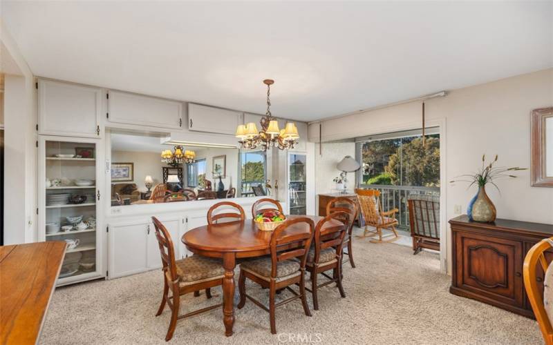 Well lit dining area and built in cabinet storage.