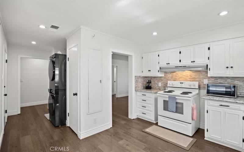 Kitchen showing laundry area