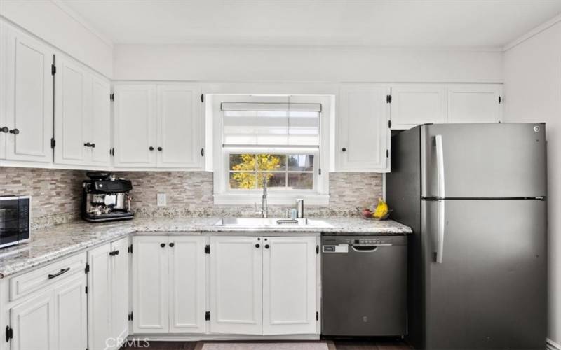 Kitchen with Refrigerator and dishwasher