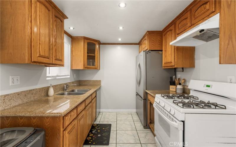 Spacious galley Kitchen with everything that you need close at hand! Sale includes the refrigerator!