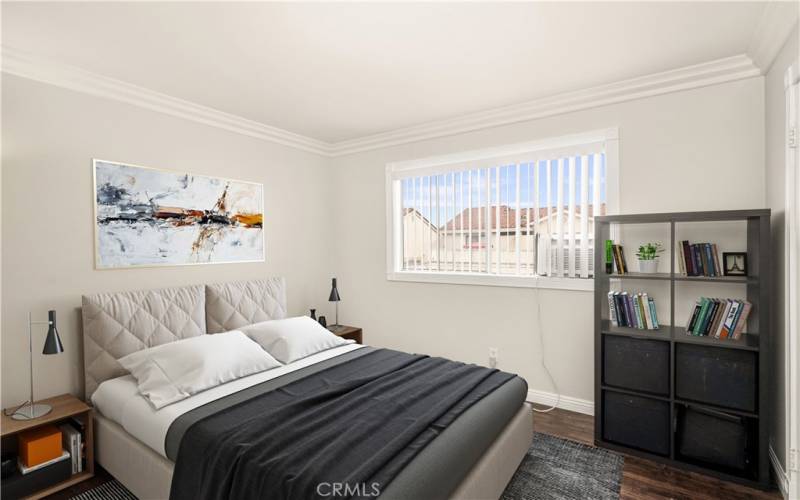 Bedroom #2 has large walk-in closet, solid surface flooring, and new blinds!