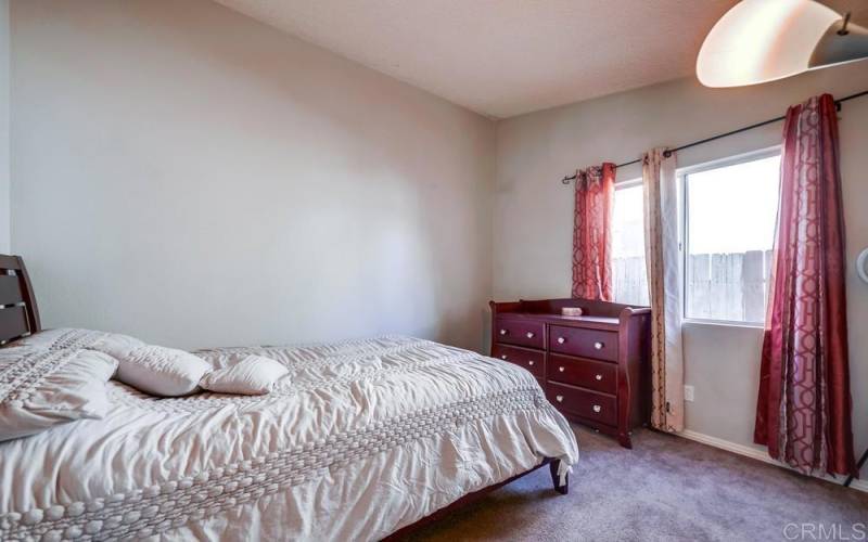 This bedroom is approx. 10 ft x 10 ft and has a nice window with lots of natural lighting