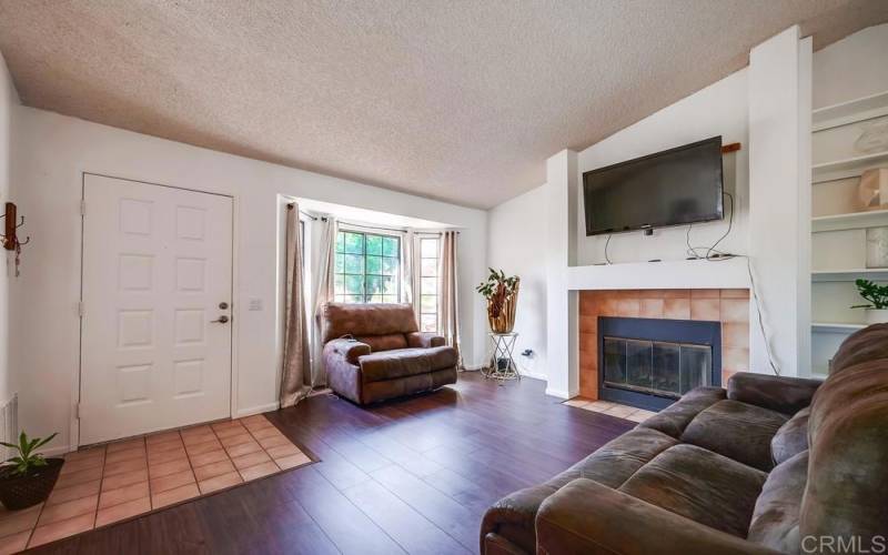 View from hallway back toward the Living Room showing off that big beautiful window