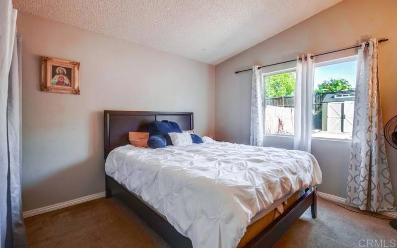 This bedroom is approx. 10 ft x 10 ft and has a nice window with lots of natural lighting