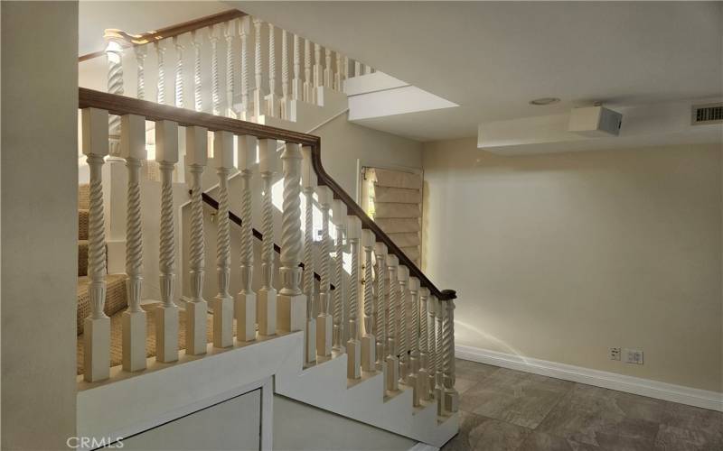 Stairs to the guest room or home office.