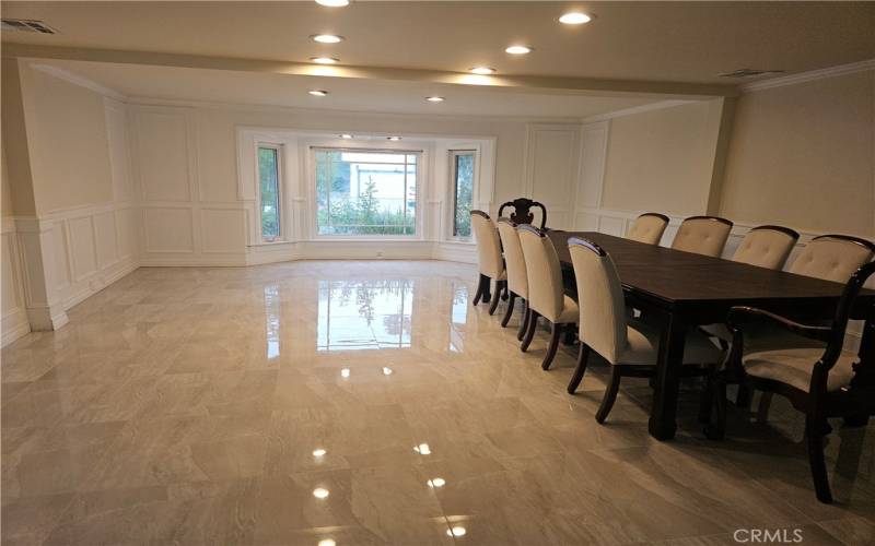 Large Formal Dining Room with 12-seater dining table.