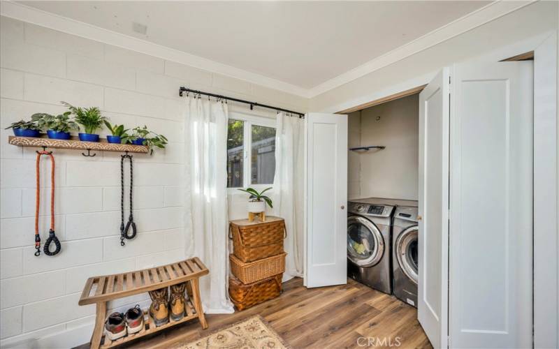 Main level laundry with access to back patio