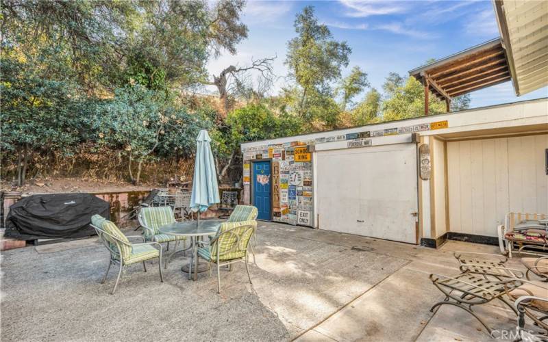 Back concrete patio/BBQ and entertaining area.