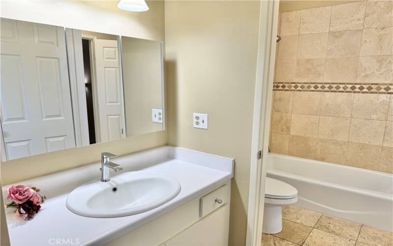 Single Vanity next to Bathroom in master bedroom