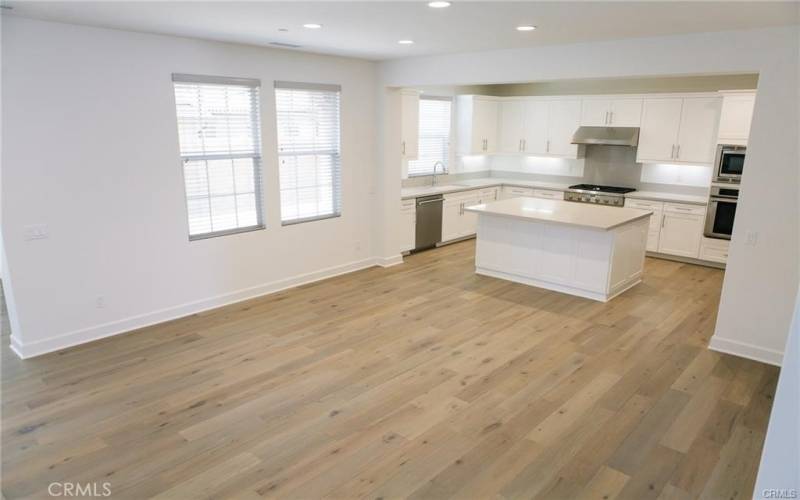 Open floor plan with kitchen.