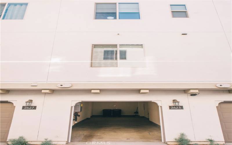 The tandem 2-car garage is on the first floor.