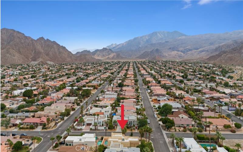 Aerial View of Property and Proximity to Mountains