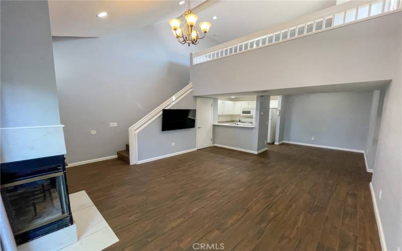 Living room with fire place & deck