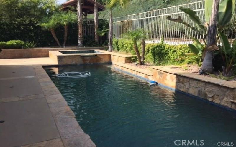 amazing private pool and spa backyard.