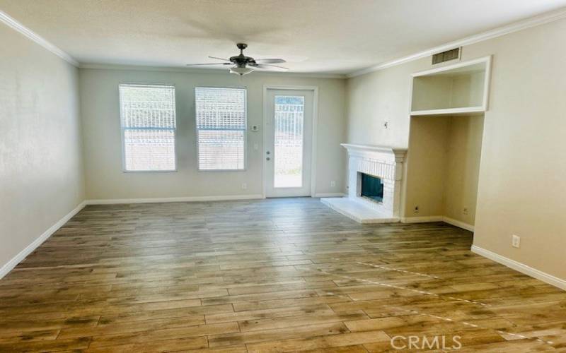 Expanding family room with fireplace.