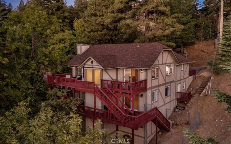 Aerial sunset view of rear of the home