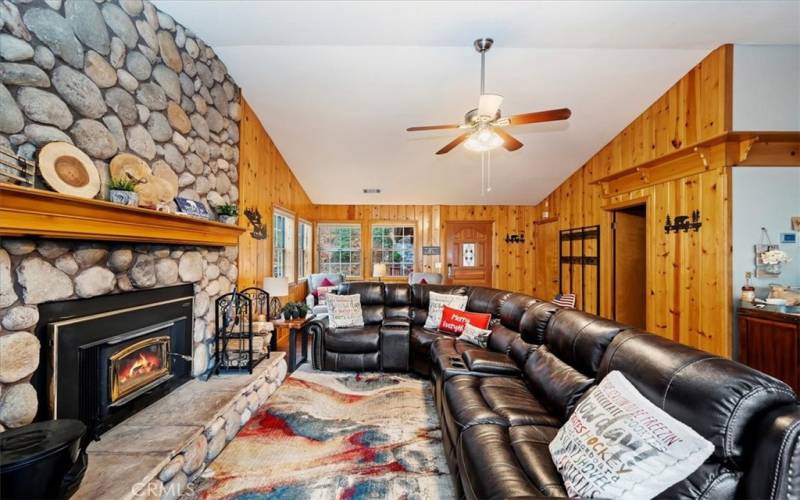 Stone fireplace wall in living room