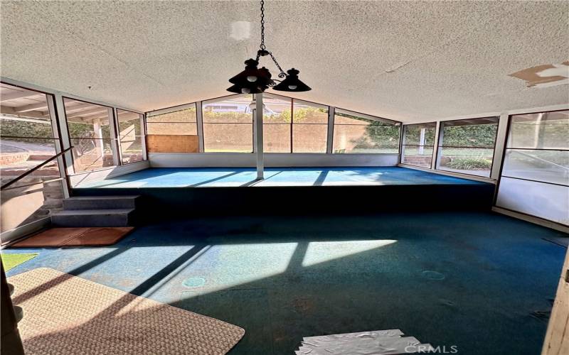 Screened in by level Porch; view from dutch door in kitchen