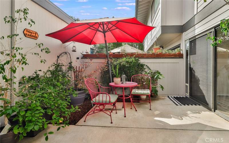 Your private patio between garage and home