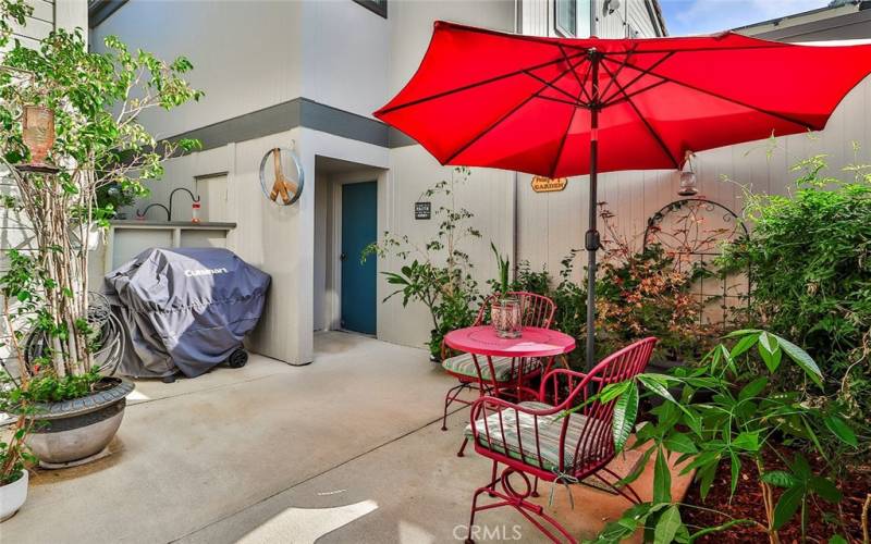 Patio leading from garage to the home