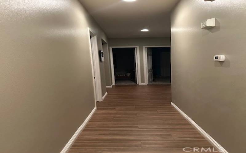 Hallway that leads to Master Suite and three other bedrooms.