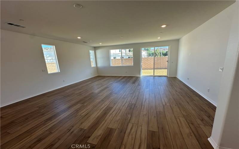 Large Great Room Before Window Treatments & Furniture