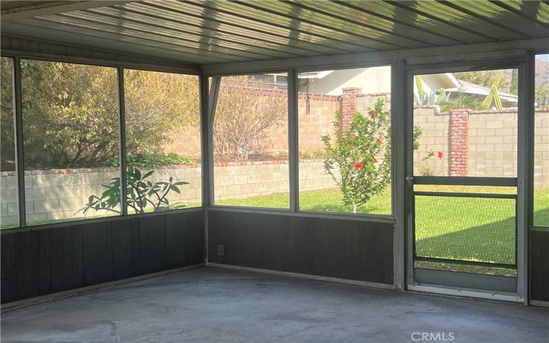 Screened-in back patio