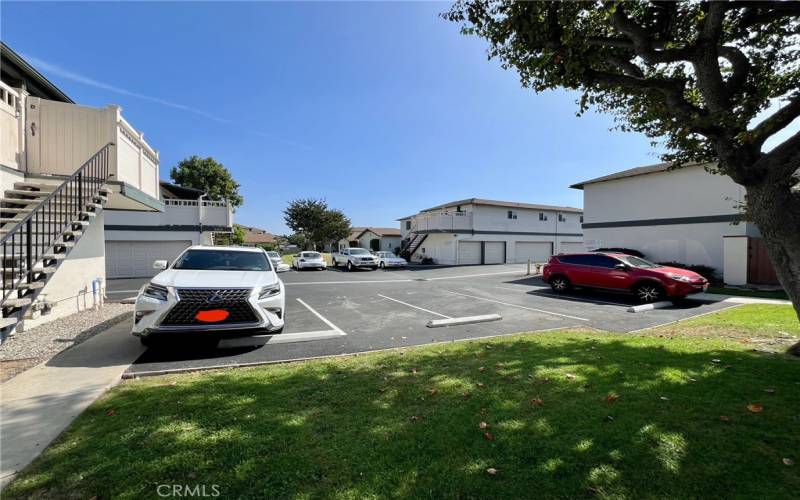 Outside parking area, walkway to garage