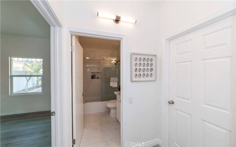 full bathroom between two bedrooms