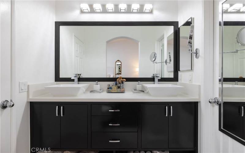 Fully remodeled Primary bathroom, dual vessel sinks, espresso cabinetry, new light fixtures and new shower