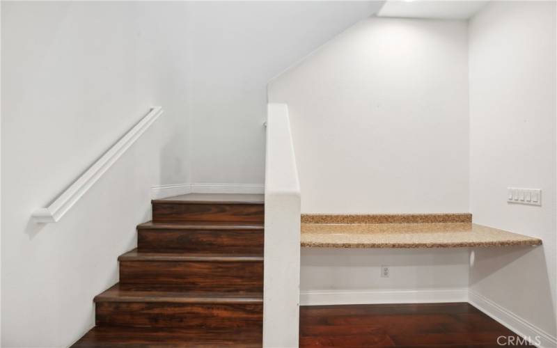 Hardwood floor stairs.