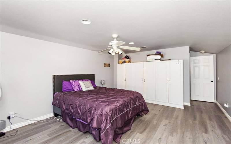 Bedroom 4 upstairs with built-in cabinetry