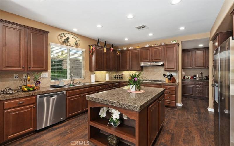 Huge kitchen with plenty of storage space and stainless steel appliances