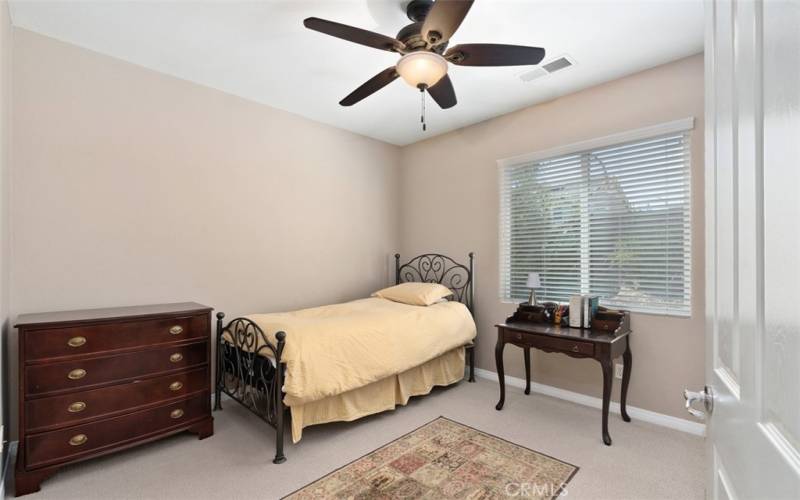 Main floor bedroom, which is one of four.