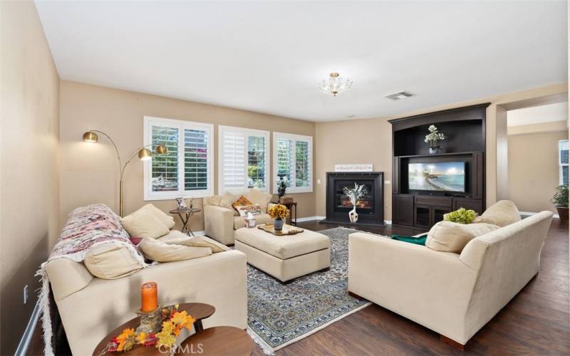 Living room with a beautiful built in.