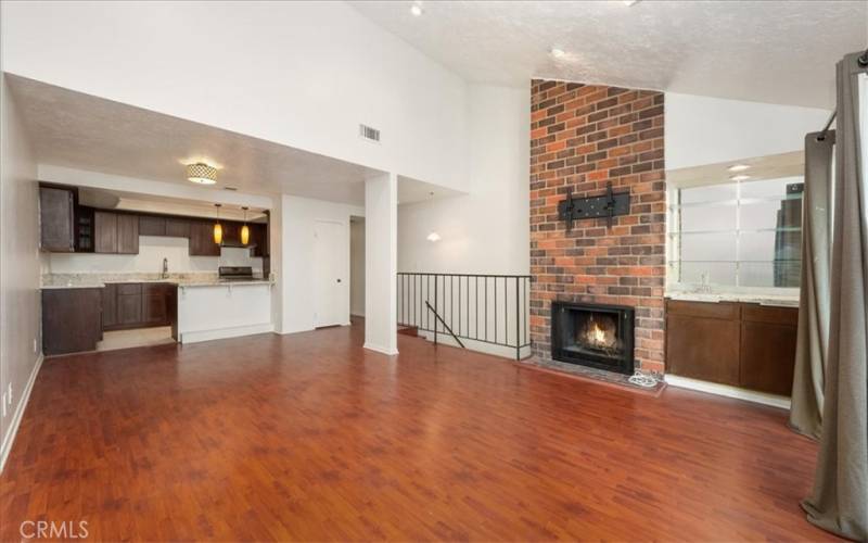 Living room with fireplace and bar