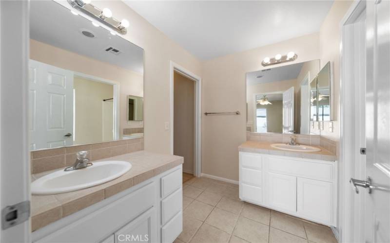 Two vanities in primary bathroom