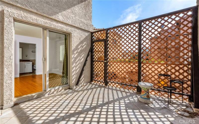 Patio attached to lower level bedroom.