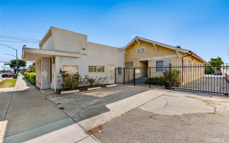 Automatic gate allows access to the garage in the back and back yard. One story remodeled home.The commercial structure needs work, but offers a great potential. Live in one and work in the other.