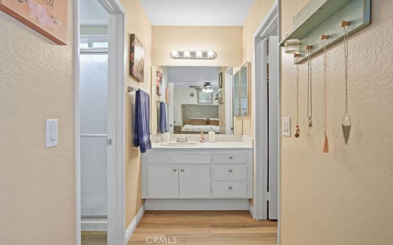 Bathroom on the left - walk-in closet on the right!