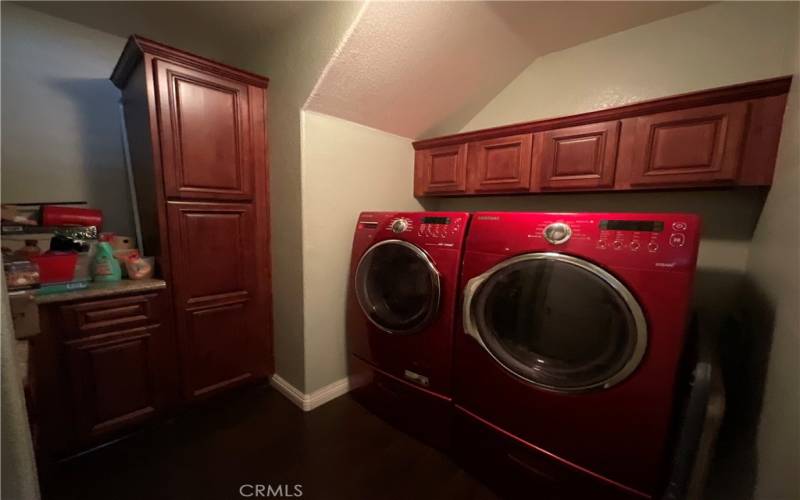 beautiful separate laundry room downstairs by garage