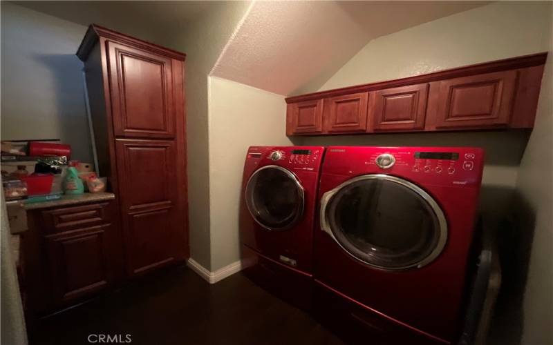 beautiful separate laundry room downstairs by garage