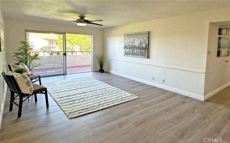 Living room opens to private balcony